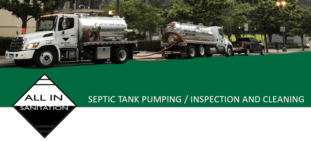 Vacuum trucks performing septic tank pumping and inspection services on a city street.